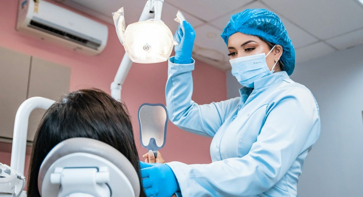 Dentist examining a patient during a routine checkup
